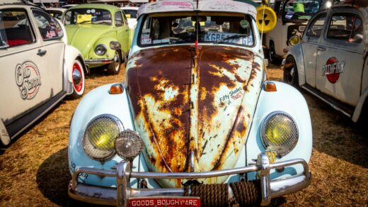 white volkswagen beetle coupe parked